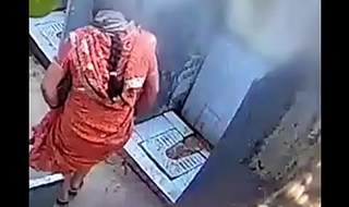 Desi bhabhi pissing in open toilet