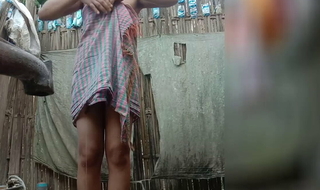 Indian village girl washing
