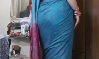 Indian stepmom teasing stepson with big ass