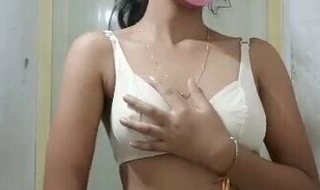 Indian sexy girl showing her boobs  and fingering her pussy.