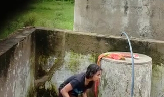 Indian Village Girl Laving Near Water Tank Outdoor