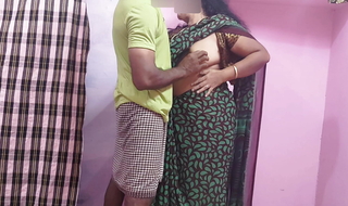 Beautiful Indian Aunty was working outside the house young boy I carried her inside the room and enjoyed her sex.