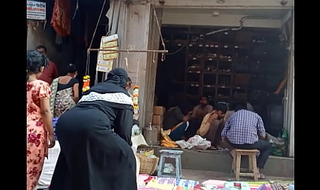 Indian muslim aunty seated ass at market